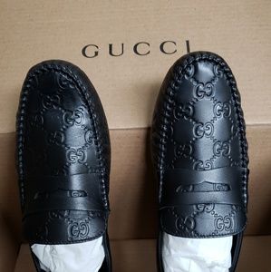 Gucci authentic NWT black leather driver loafers
